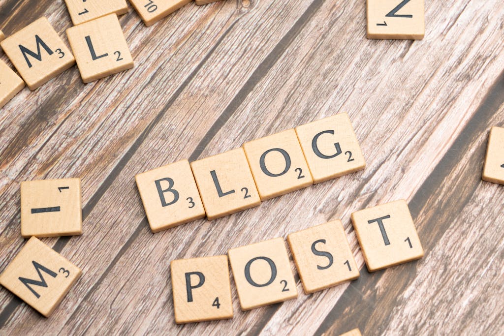 Blog isn't growing? | Wooden letter tiles spelling 'Blog Post' on a wooden background, ideal for online media concepts.